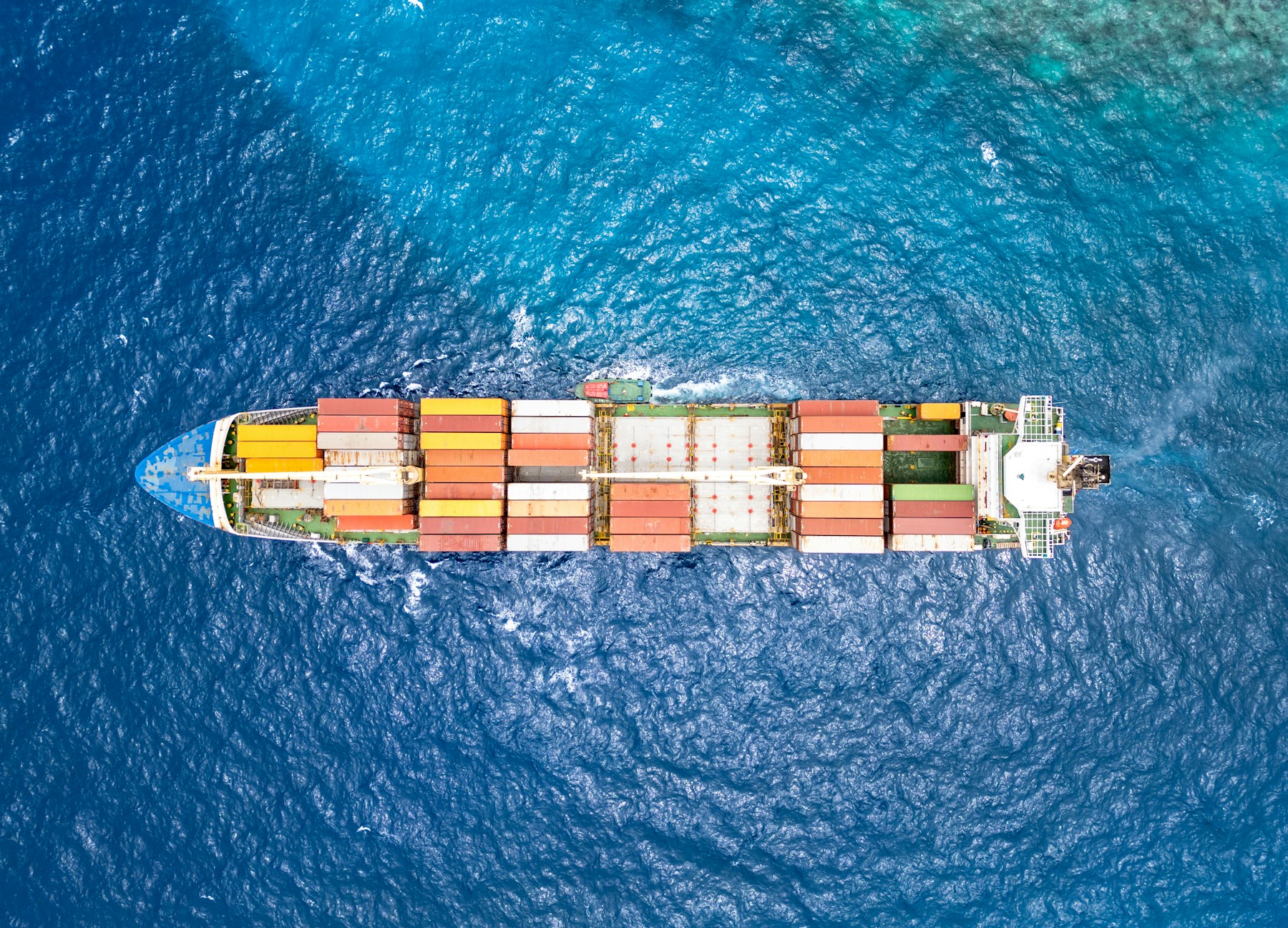 Aerial view of a cargo ship at sea